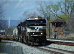 NS 7025 leads NS yard job E19.  The Langley fountain is doing its thing in the distance, and long-empty ND Cabin sits to the right.